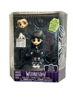 Wednesday Deluxe 6-inch Articulated Figure, 9 pieces, Interchangeable Face Plates and Fashion, Customizable Collectible Figurine, Kids Toys for Ages 3 Up